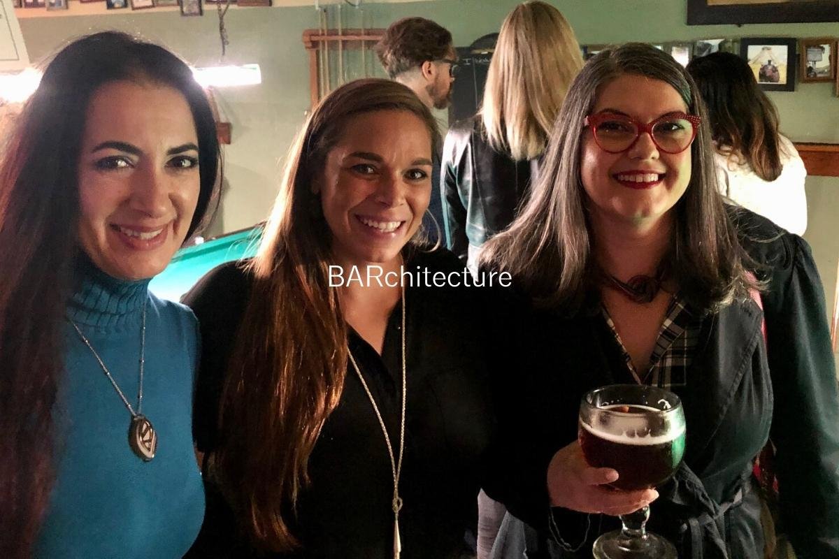 Three members share a laugh at a BARchitecture social