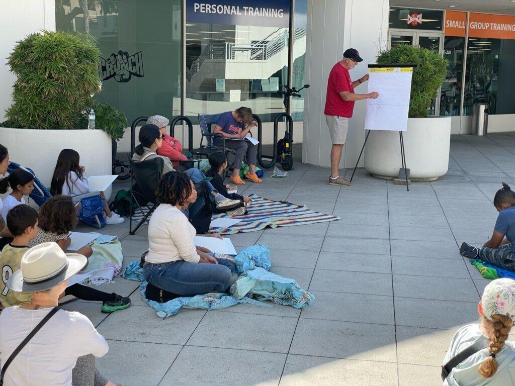 Kids drawing together at the Kids Draw Architecture event